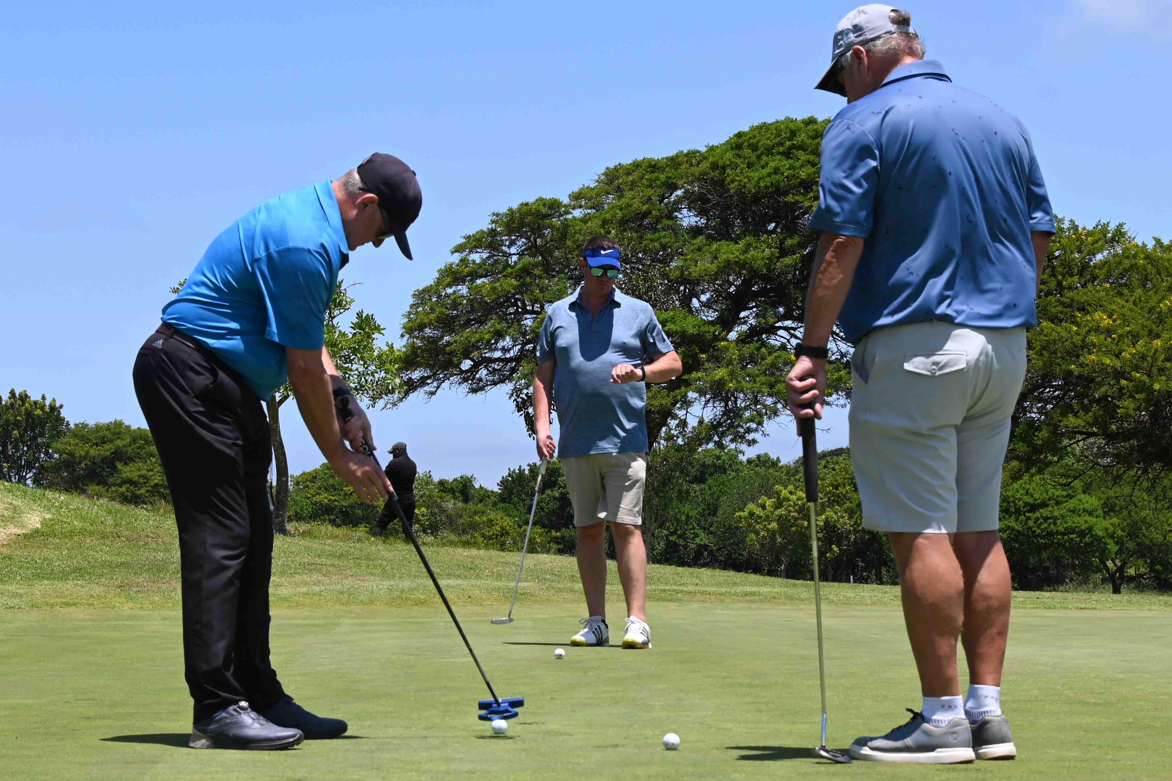 Group of attendees posing for a photo